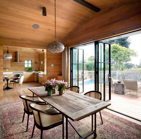 Compelling features include the quality of light that plays on the oak surfaces and interior volumes developed by interior designer Sherry Williamson.