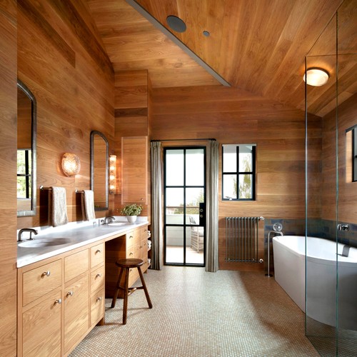 For efficient and aesthetic reasons, the home features narrow profile metal windows and doors that are thermally broken and meet requirements for a LEED Platinum rating.